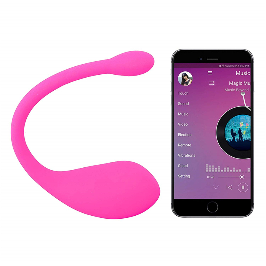  A Wireless Vibrator with a phone besides it, open to the app. 