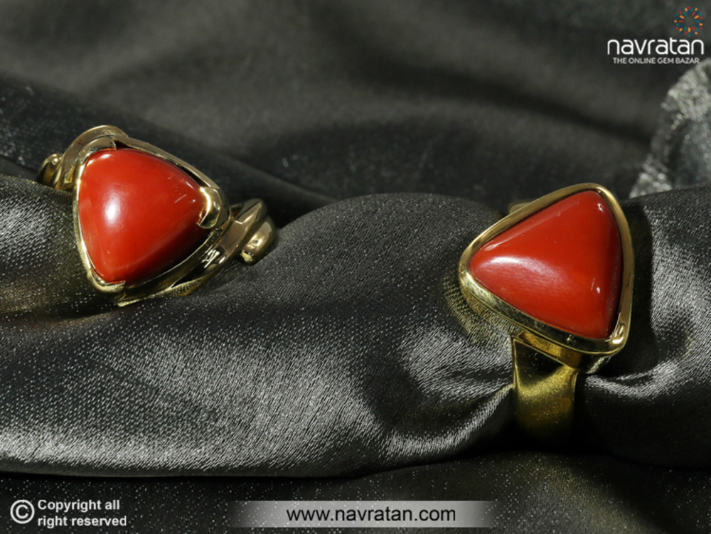 What are the benefits and negative consequences associated with wearing the Red Coral gemstone?