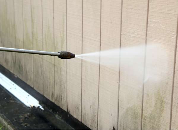 12. Use a Pressure Washer