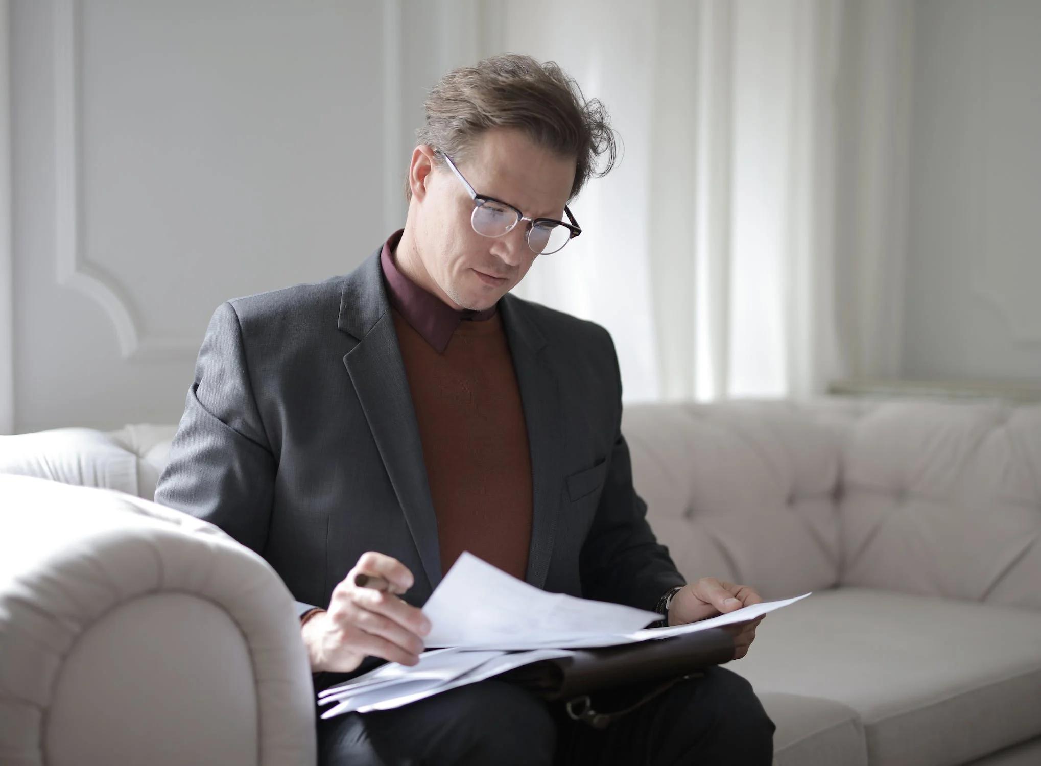 An image of a lawyer looking at the documents