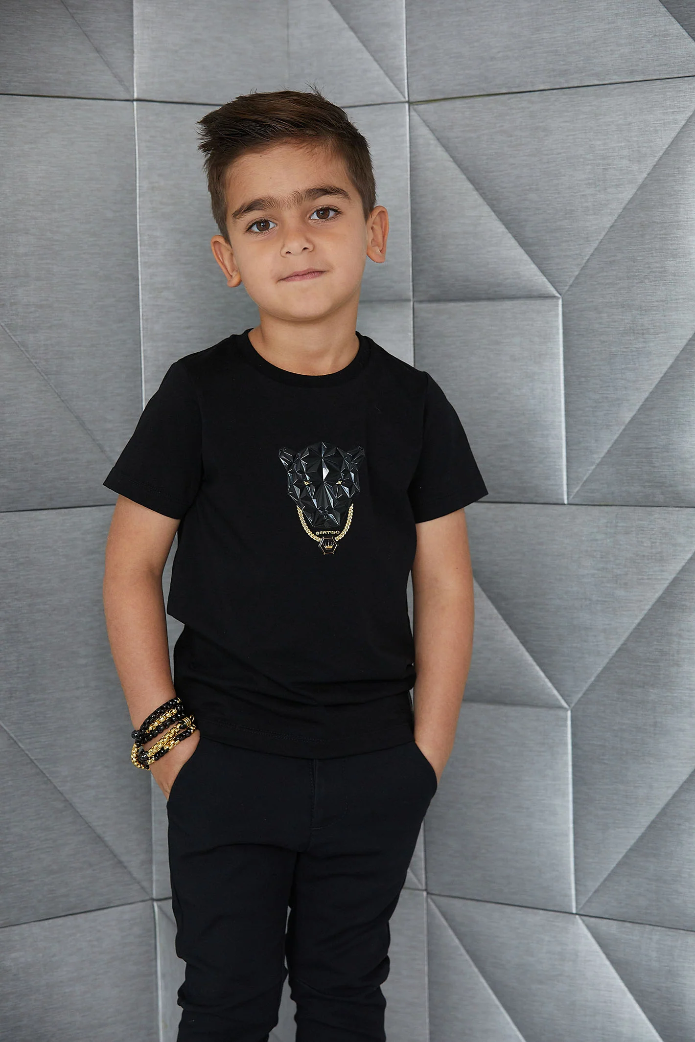Effortlessly Stylish: Black Shirts Paired with Gold Chains