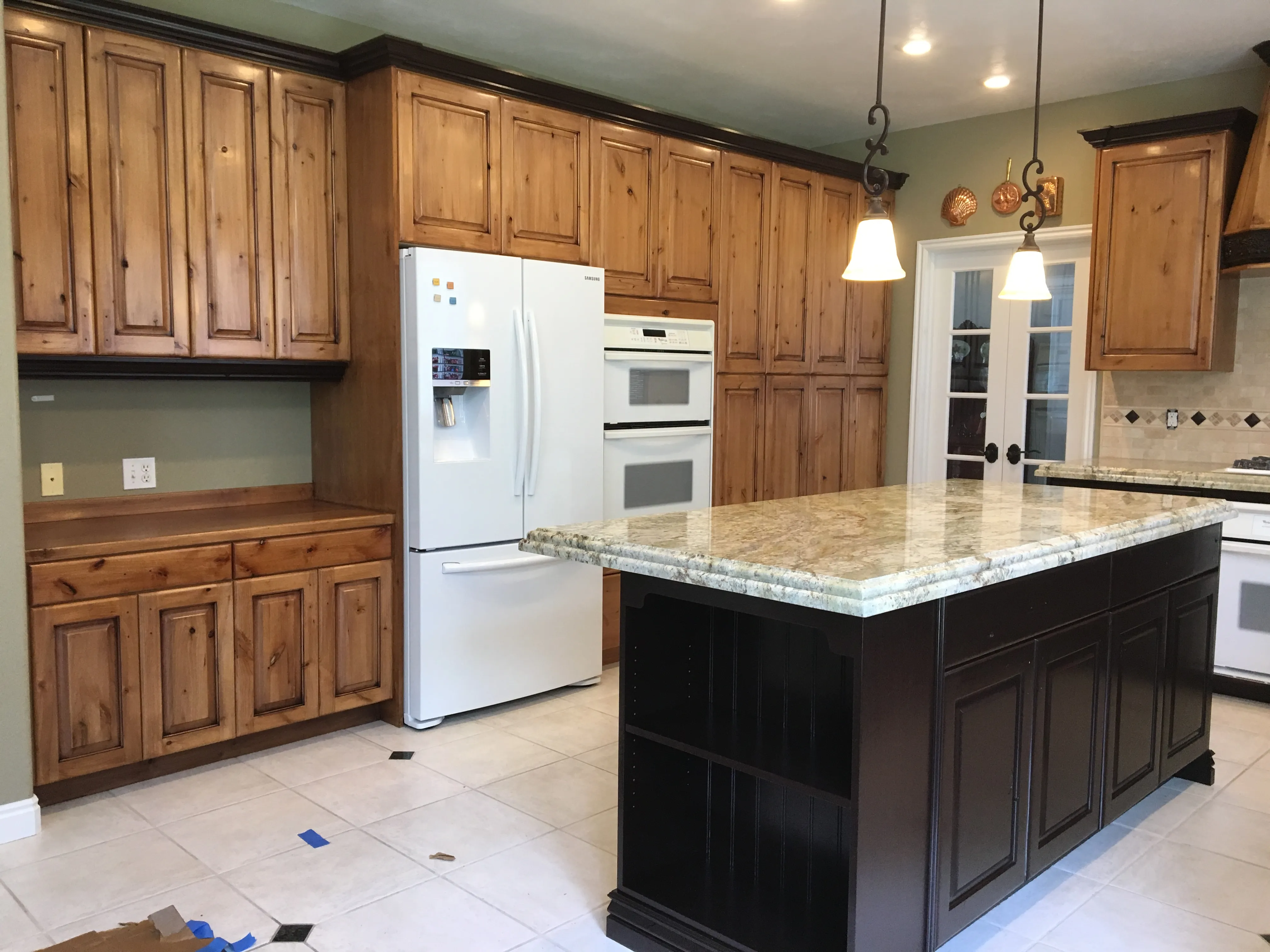 Revitalizing Your Kitchen: The Magic of Cabinet Refinishing