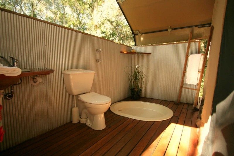 Glamping Bathroom Ideas: How to Bring Comfort and Style to the Outdoors