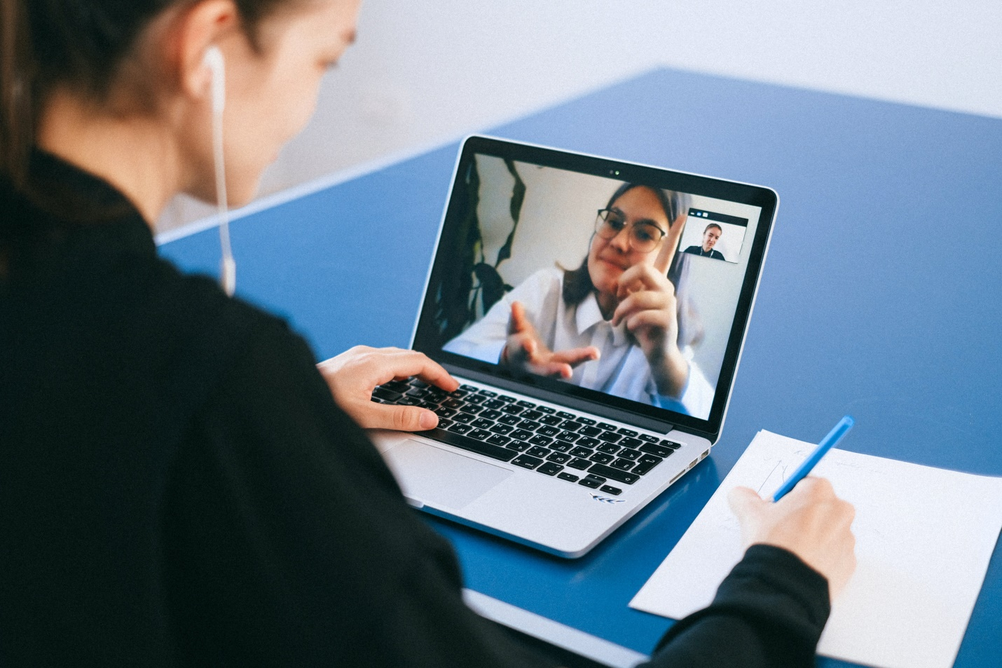 a doctor and patient on a video call